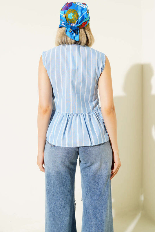 Chemise à rayures bleues avec nœud sur le devant