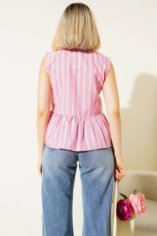 Chemise rose à rayures et nœud sur le devant