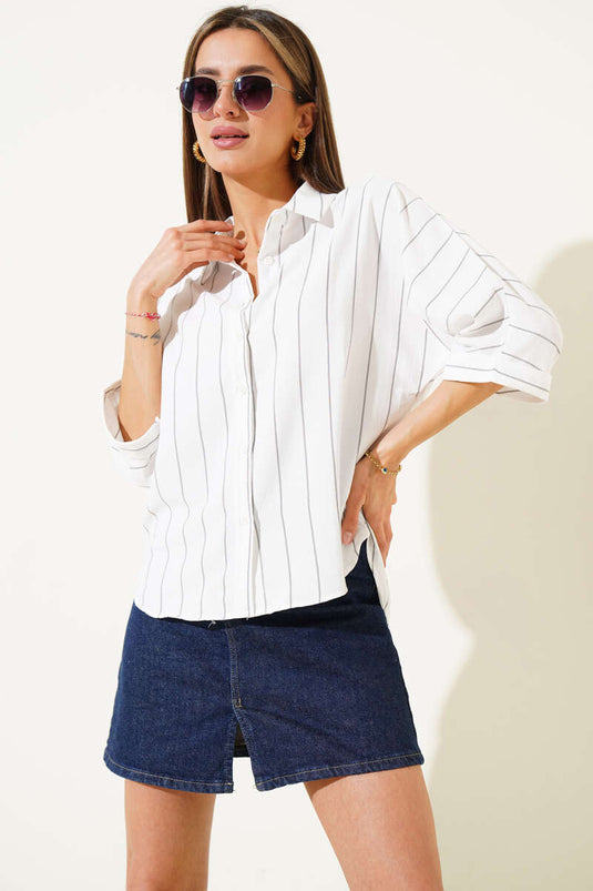 Chemise rayée décontractée à manches chauve-souris noire