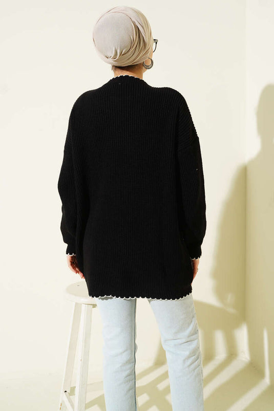 Tunique tricotée noire avec détail de point de berger