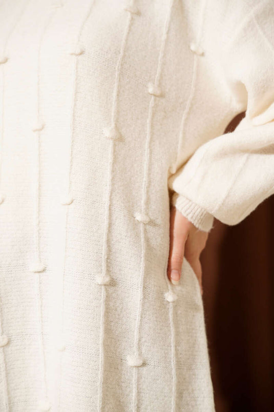 سترة محبوكة منفوشة منقوشة بقطرات الماء