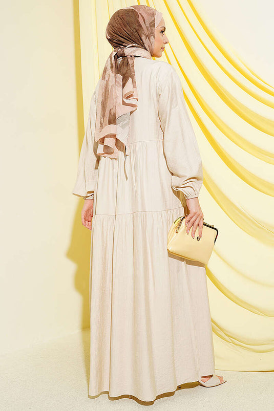 Vestido en capas con botones y detalle de cinta de encaje beige