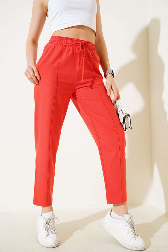 Broek met smalle, elastische taille en geribbelde pijpen, tegelkleur