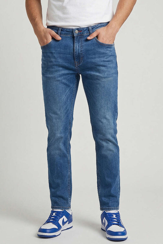 Pantalon homme en jean bleu avec empiècement en lycra Dar Paça