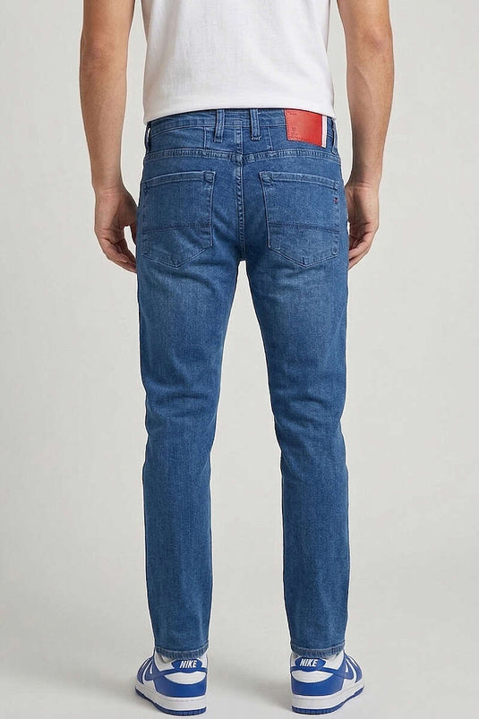 Pantalon homme en jean bleu avec empiècement en lycra Dar Paça