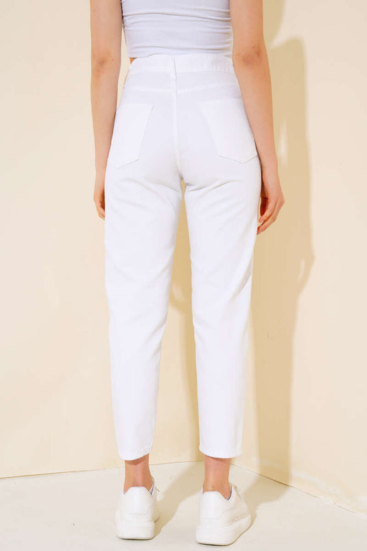 بنطلون أبيض ضيق ممزق