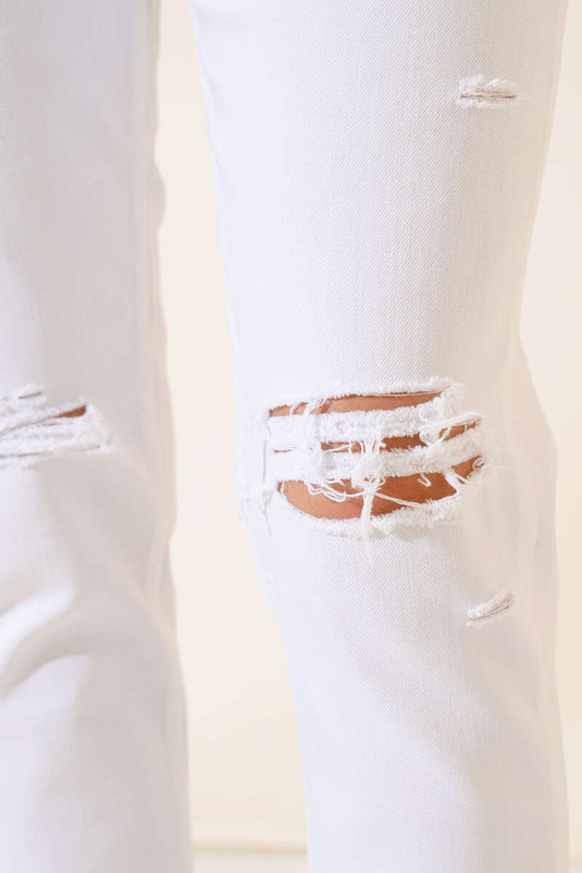 بنطلون أبيض ضيق ممزق