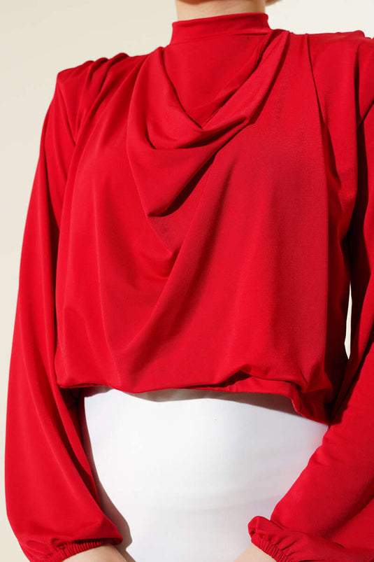 Sandy Bluse mit Wasserfallausschnitt und gepolsterten Schultern in Rot
