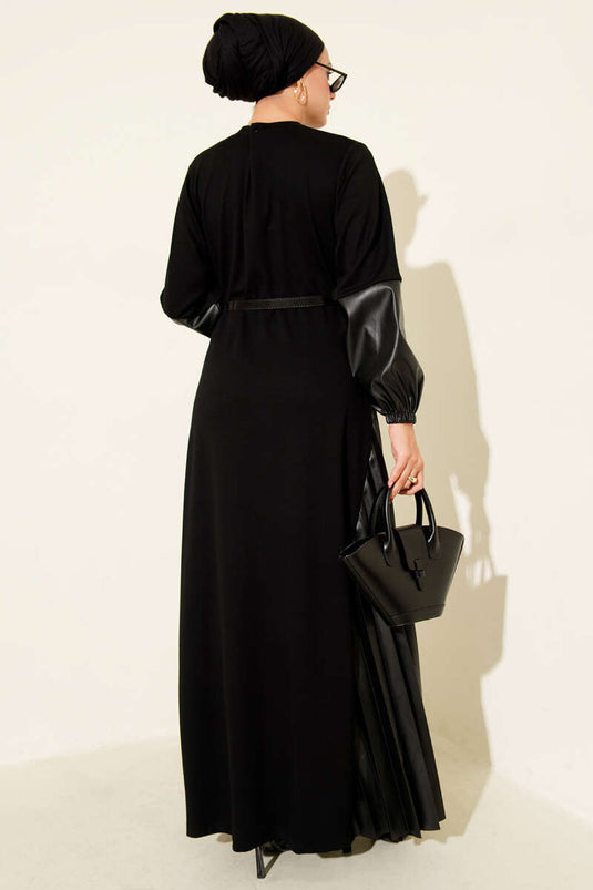 فستان أسود مزين بالجلد وحزام