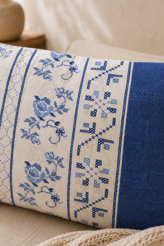 Housse de coussin à motifs bleue