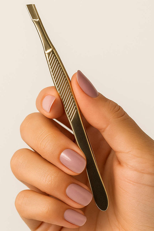 ملقط ذهبي منقوش