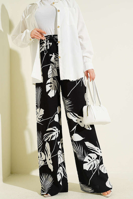 Pantalon à jambes larges élastiqué à motif noir à motifs