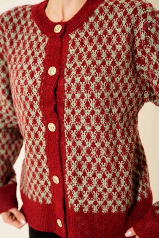 Gilet en maille vert à boutons dorés à motifs