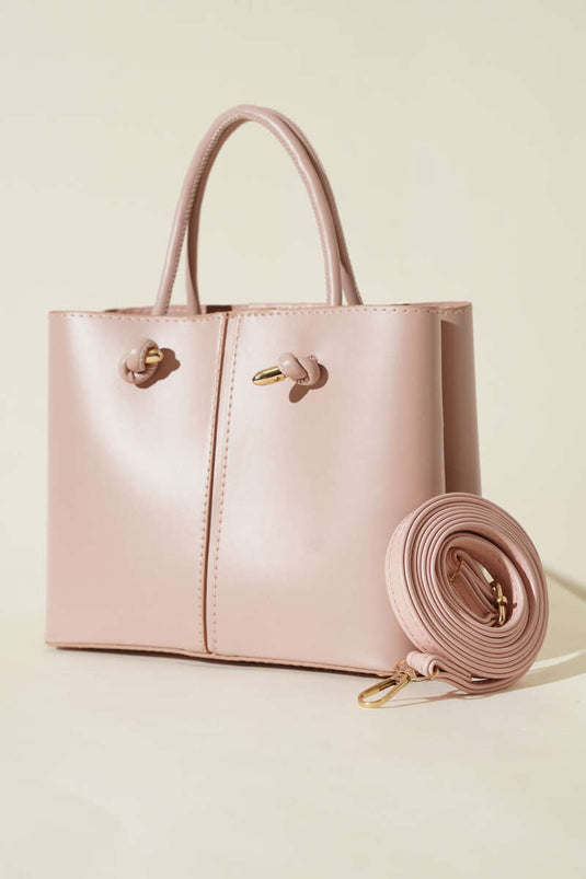 حقيبة يد نسائية بتفاصيل خياطة، لون وردي فاتح