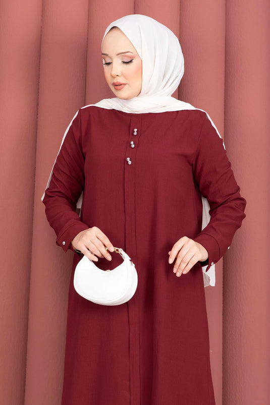 Ensemble tunique et pantalon bordeaux avec bouton décoratif