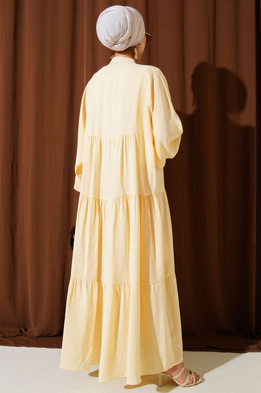 فستان بأزرار وأساور مطاطية، أصفر