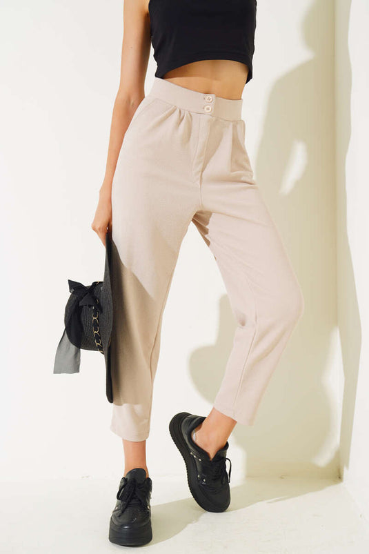 Pantalon skinny boutonné couleur pierre