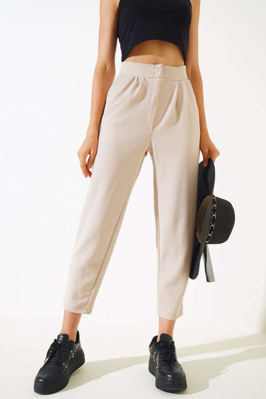 Pantalon skinny boutonné couleur pierre