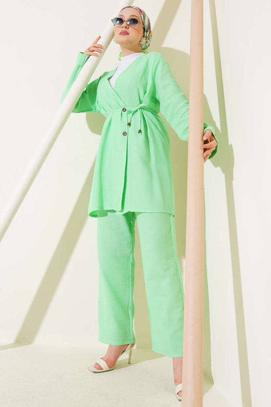 طقم من قطعتين من الموسلين بأزرار ورباط، لون أخضر مائي