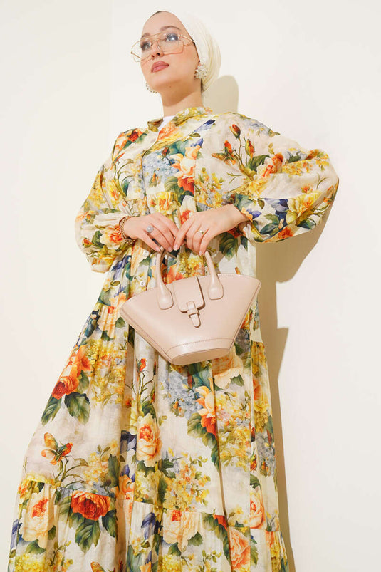 Gemarmerde rozenpatroonjurk geel