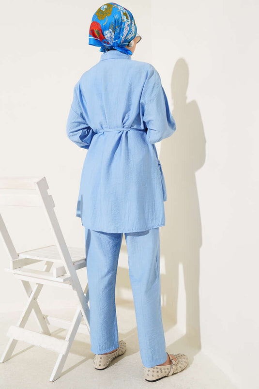 Tweedelig setje met rok met ruches en strikceintuur, blauw