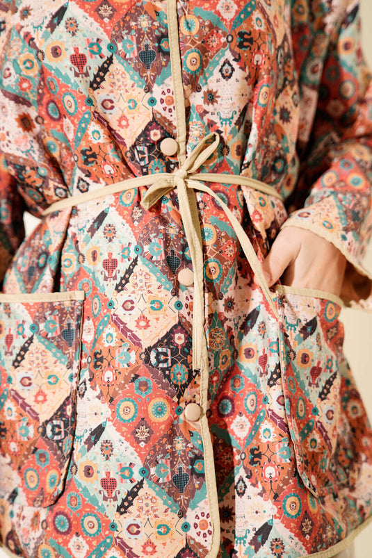 Veste à boutons-pression à motifs ethniques couleur latte