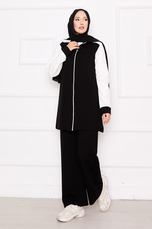 Combinaison de sport deux pièces zippée et garnie noire