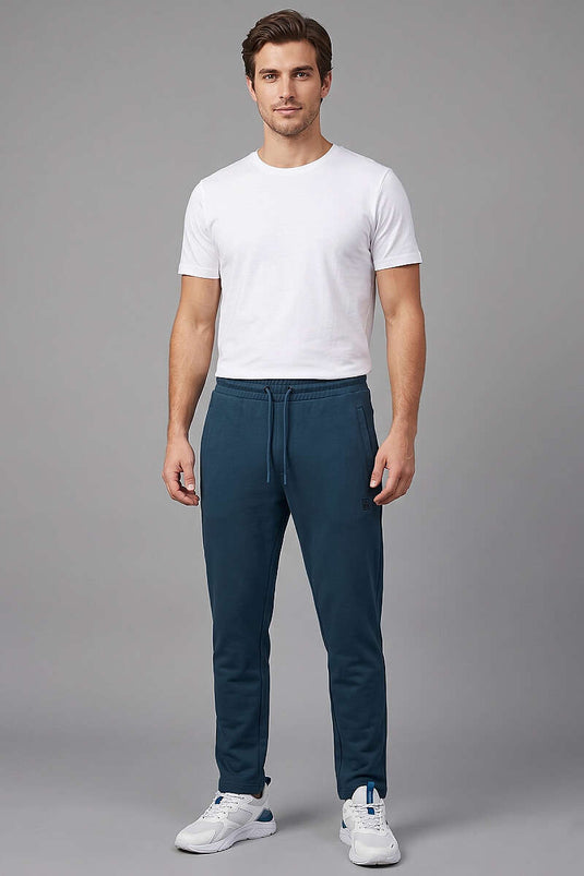 Pantalon de survêtement homme avec poches zippées, couleur pétrole
