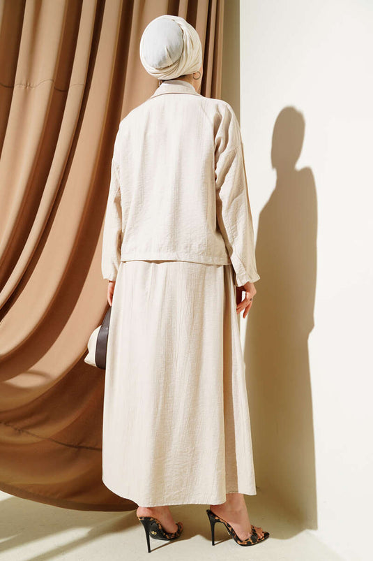 Ensemble deux pièces beige à jupe à rabat et poches zippées