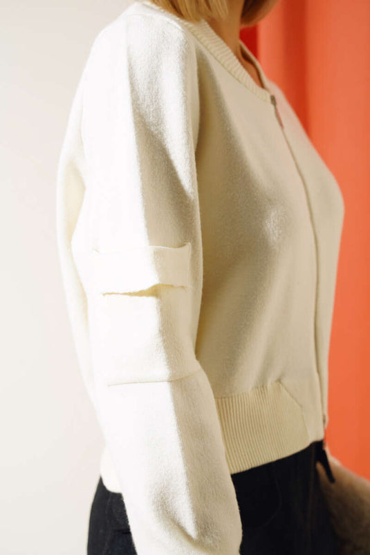 Gilet court zippé en maille couleur os