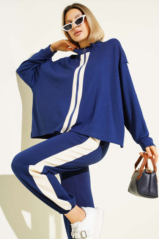 Completo due pezzi con cerniera e righe, blu navy