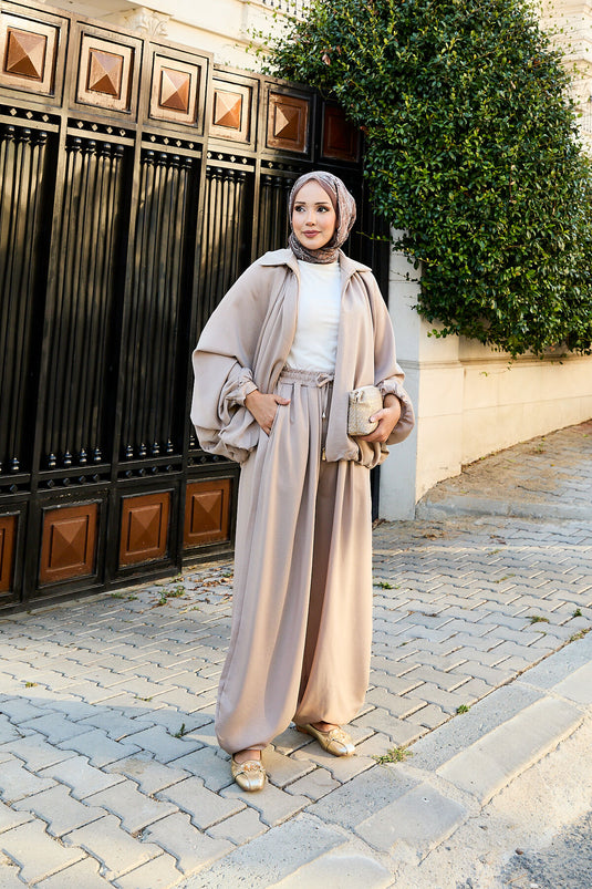 بدلة فضفاضة من قطعتين بأكمام خفاش وسحاب من المنك