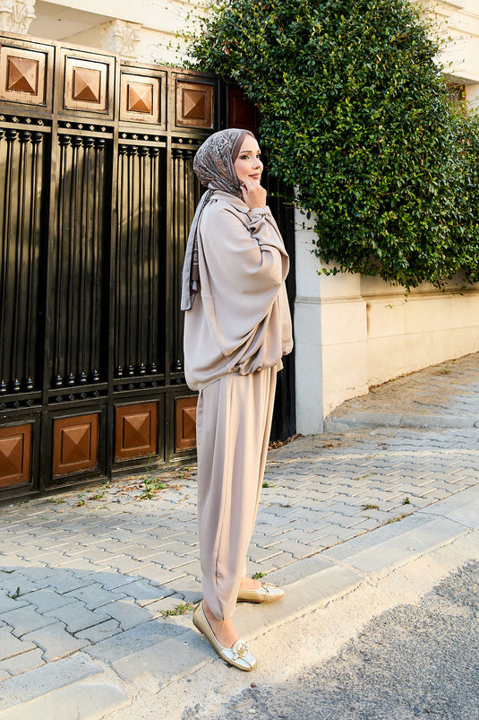 بدلة فضفاضة من قطعتين بأكمام خفاش وسحاب من المنك