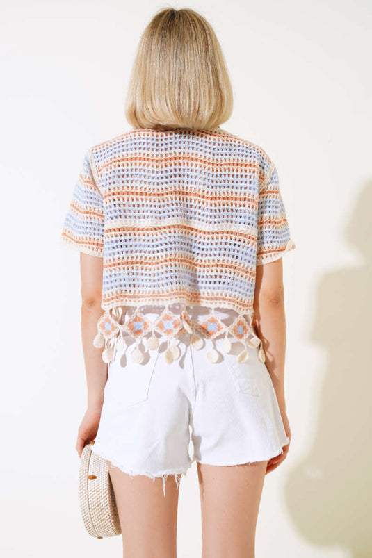 Orangefarbene Spitzenbluse