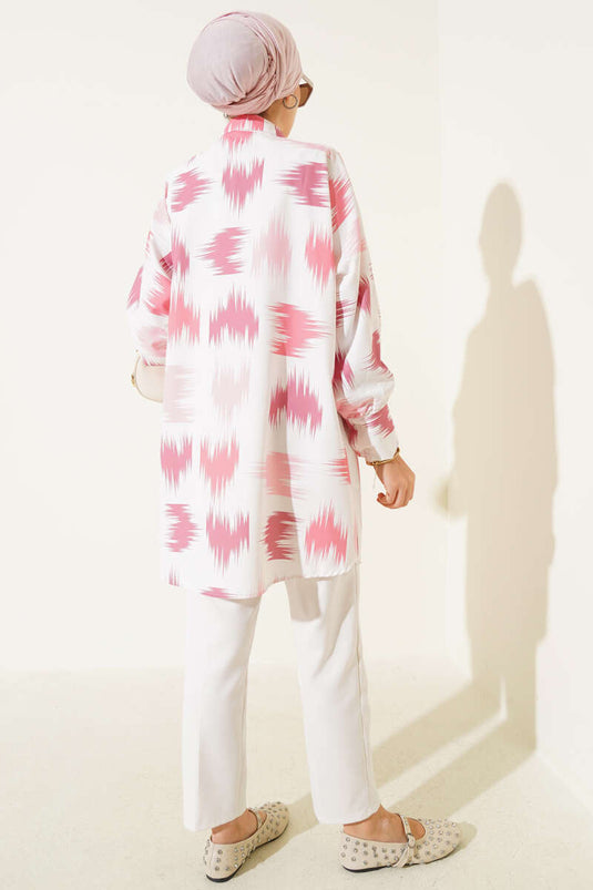 قميص وردي منقوش بفرشاة معصم