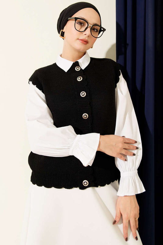 Gilet en maille noir à boutons et détails à volants