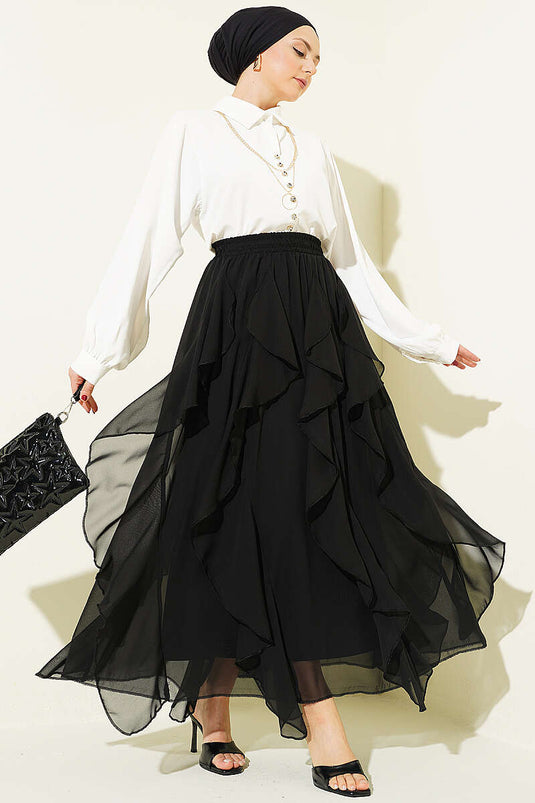 Jupe en chiffon noire à taille élastiquée et volantée