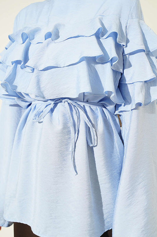 Tunique bleue à ceinture cordon et volants