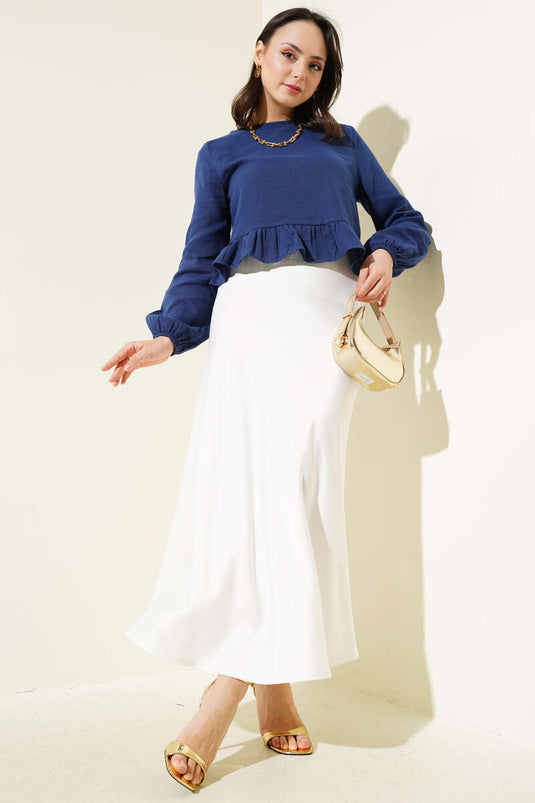 بلوزة كتان مكشكشة باللون الأزرق الداكن