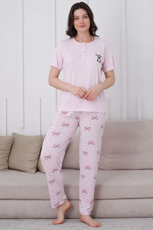 Ensemble pyjama rose à boutons et motif nœud