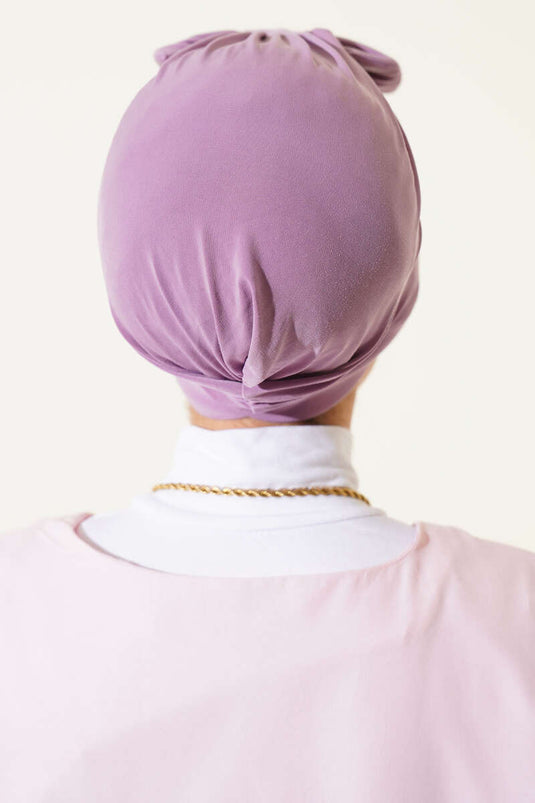 غطاء رأس مزين بفيونكة، لون أرجواني فاتح