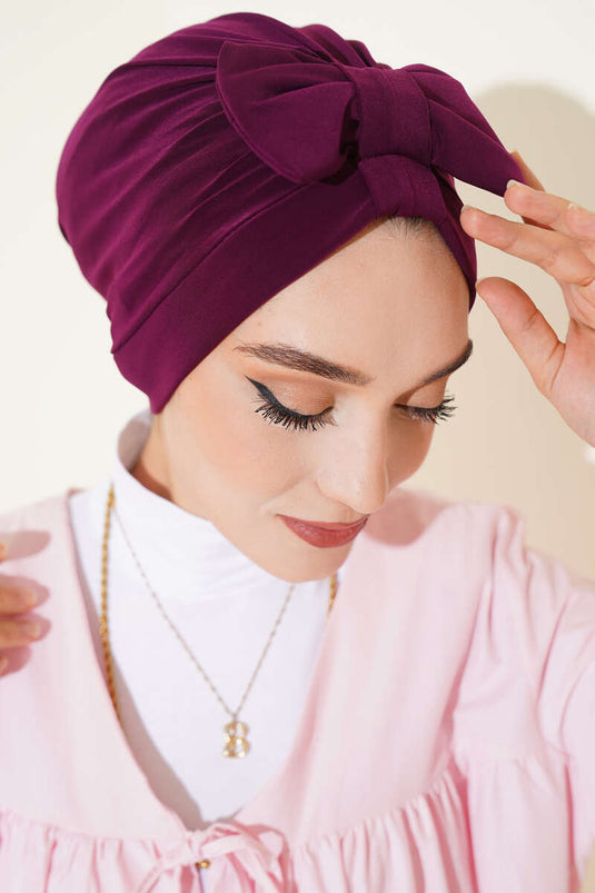 قبعة مزينة بفيونكة، لون البرقوق