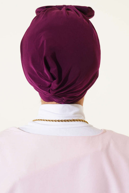 قبعة مزينة بفيونكة، لون البرقوق