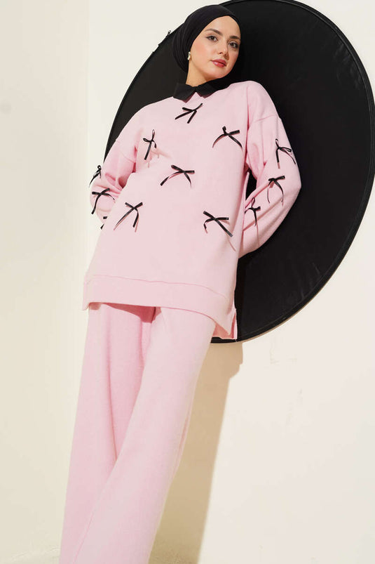 طقم مكون من قطعتين مطبوع عليه فيونكة باللون الوردي