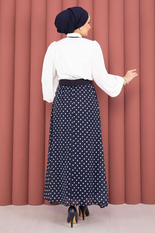 Ensemble chemise à foulard et jupe ceinturée à pois bleu marine