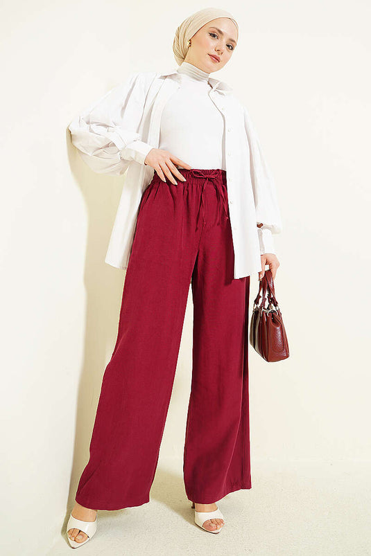 Pantalon Tensel bordeaux à taille élastique et jambes larges