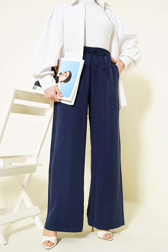Pantalon élastique en tensel à jambes larges bleu marine