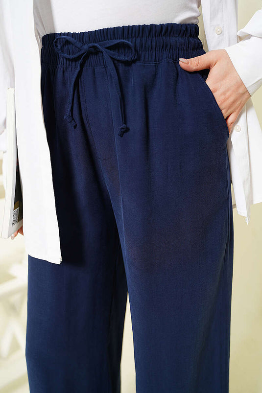 Pantalon élastique en tensel à jambes larges bleu marine