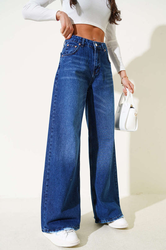 Pantalon en denim effiloché à jambes larges