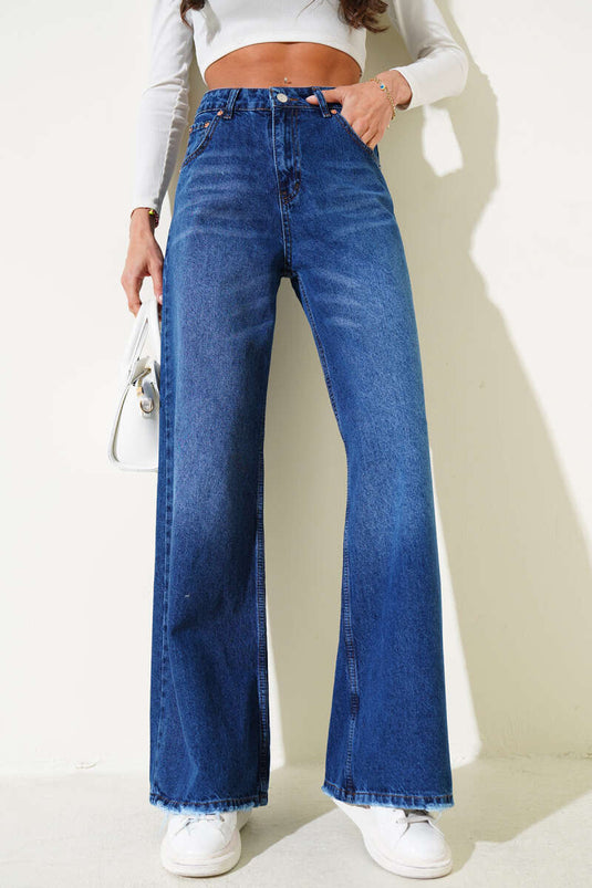 Pantalon en denim effiloché à jambes larges